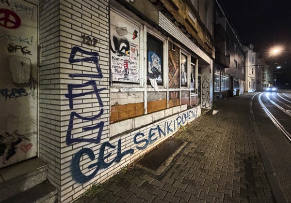 Decaying façade covered with graffiti, no-go area in Gelsenkirchen, one of the poorest cities in