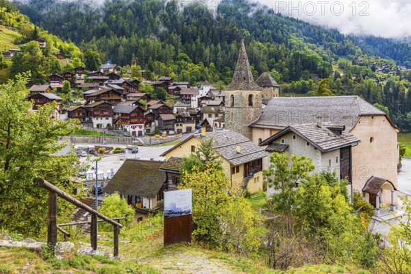 The mountain village of Vissoie with the Sainte-Euphemie church, Val d'Anniviers, Valais Alps,