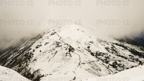 Another onset of winter in May, hiking trail from the Kanzelwandbahn mountain station to the