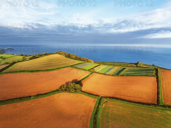 Colours of autumn Fields and Farms over Sheldon from a drone, Torbay, Devon, England, United