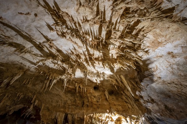 Stalactites and rock formations in a stalactite cave, Grotta del Fico, Gulf of Orosei, Baunei,