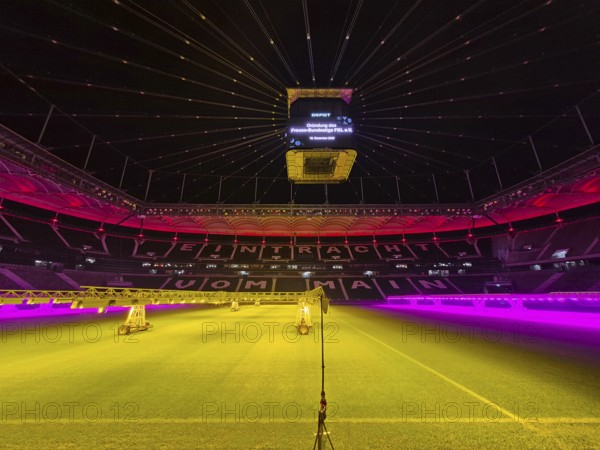 The Frankfurt Waldstadion (Deutsche Bank Park) is illuminated in red to mark the founding of the