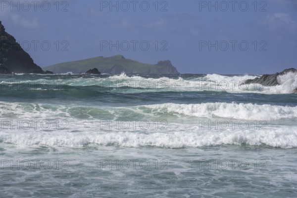 Waves crashing against cliffs in the background Inishtooskert Island (sleeping Giant), Clogher