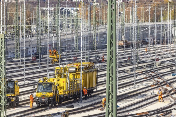 Rail construction crews with a work train. New parking station in Untertürkheim. As part of