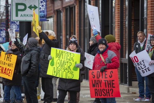Saline, Michigan USA - 1 December 2025 - Rural Michigan residents rally against the $7 billion