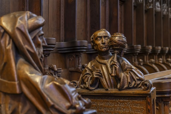 The choir stalls in Ulm Minster by Jörg Syrlin the Younger with impressive carvings. interior view.