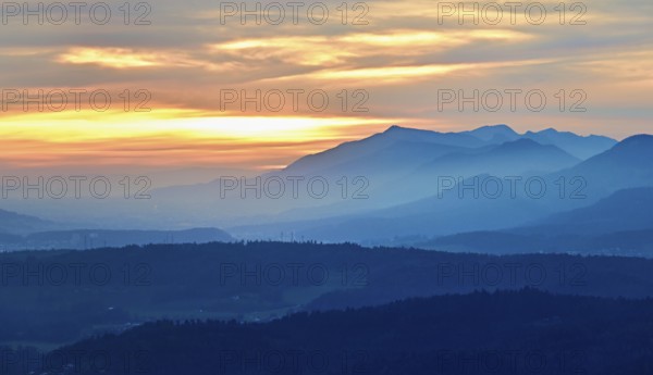 View of the Jura foothills from the Gisliflue, in the light of the setting sun, Talheim, Canton,