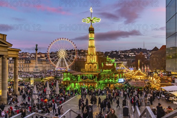 Sunset at Stuttgart's Christmas market in the Schlossplatz area. With around 3.5 million visitors,