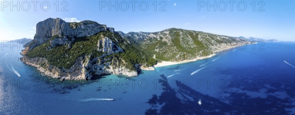 Picturesque rocky coast, cliffs and Cala Sisine beach, aerial view, Golfo di Orosei, Baunei,
