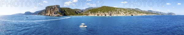 Panorama, picturesque rocky coast, cliffs and Cala Luna beach, aerial view, Golfo di Orosei,
