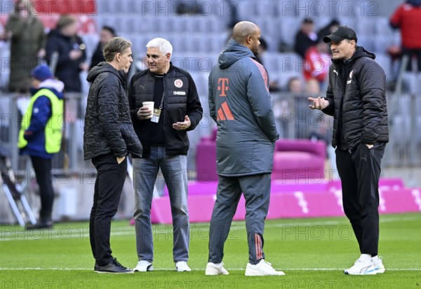Coach coach Vincent Kompany FC Bayern Munich FCB talking with coach coach Alexander Blessin FC St.