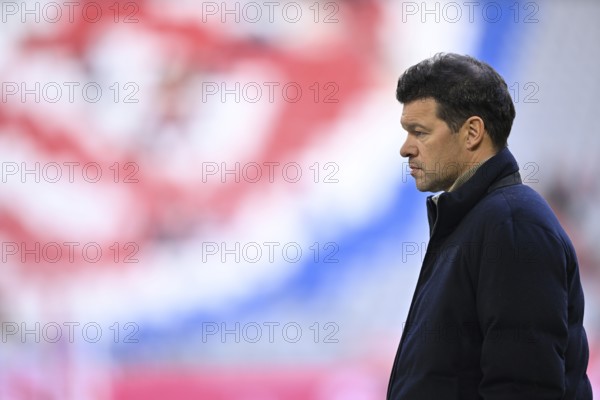 TV expert Michael Ballack in front of Logo FC Bayern Munich, Allianz Arena, Munich, Bavaria,