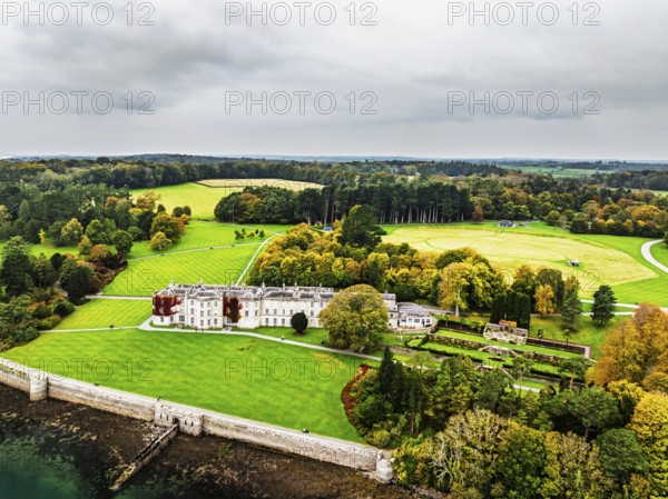 Autumn over Plas Newydd House from a drone, Gardens and Parkland, Llanfairpwllgwyngyll, Anglesey,