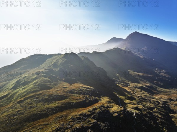 Autumn colours of Pen-y-Pass over Miner's Track, Start Point and road A4086 from a drone,
