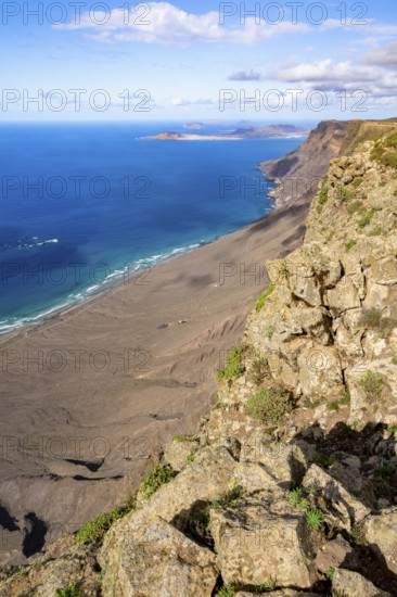 Castillejo viewpoint, view from the Risco de Famara cliffs to the coast and the sea with the Famara