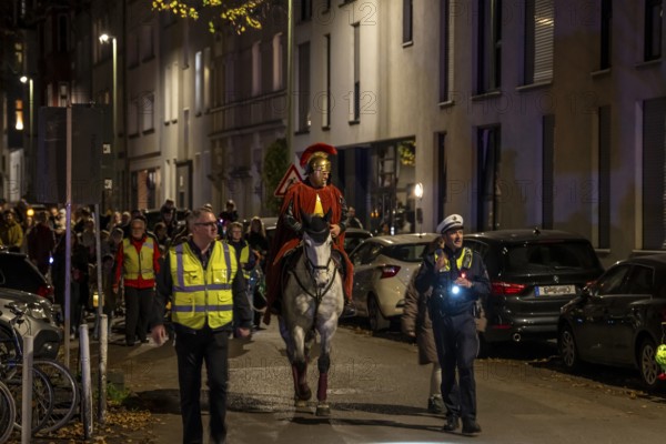 Martinszug in Essen-Rüttenscheid, the parish of St. Lambertus, Saint Martin actor on a horse, with