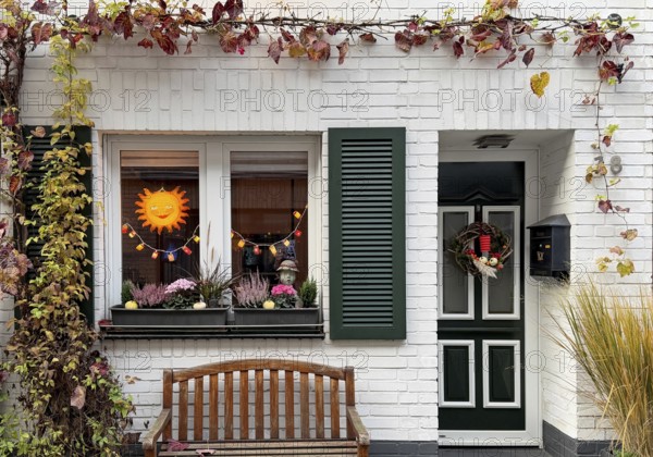 Decorated house façade for the traditional Martin procession in Tiefstraße, Altstadt, Kempen, Lower