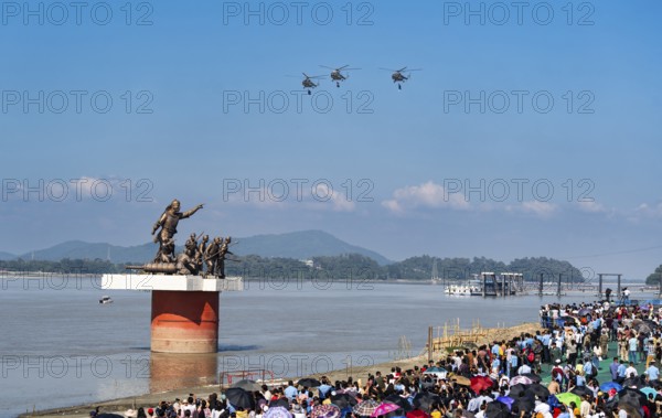 The Indian Air Force aerobatic team performs during an air show as part of the 93rd Air Force Day