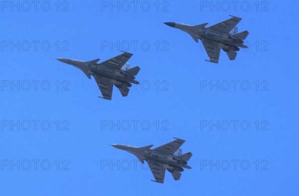 Indian Air Force aerobatic team performs during rehearsals ahead of the air show organised as part