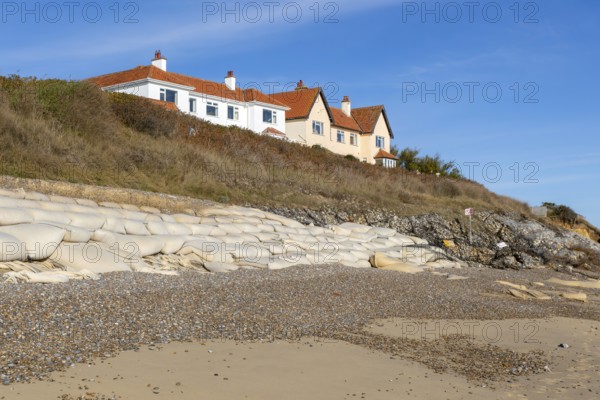 Clifftop houses at risk from coastal erosion, Thorpeness, Suffolk, North Sea coast, England, UK