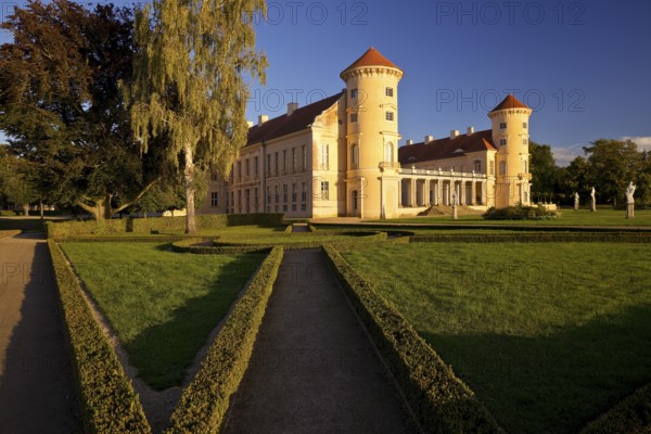 Rheinsberg Castle, front in late evening light, prime example of Friederician Rococo, Ruppiner