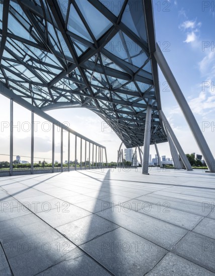 Modern architectural framework with glass and steel structure, glass facade with a greed of steel