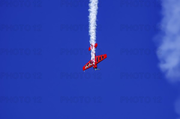 A Soviet Jakovlev Jak-55 sport aircraft with the registration LY-TOY during a flight demonstration