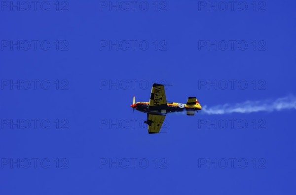 A Votec 351 sport aircraft from the Swiss MSW Aviation AG with registration HB-YMV during a flight