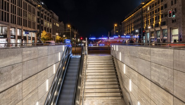 Night photo, long exposure with motion blur, modern underground entrance at Unter den Linden