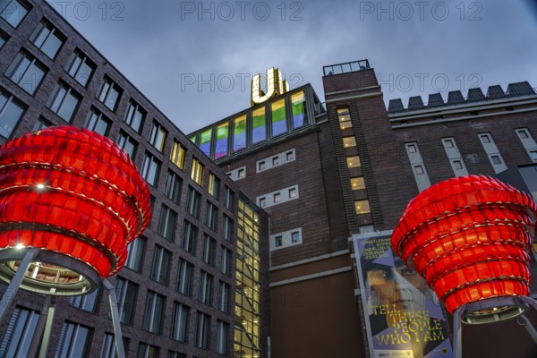 Illuminated sculptures of Dortmund roses in front of Dortmund's landmark U, Centre for Art and