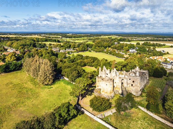 Ruins of Dirleton Castle & Gardens from a drone, Dirleton, East Lothian, Scotland, UK