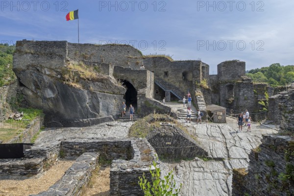 9th century medieval ruined hill castle overlooking the city La Roche-en-Ardenne in summer,