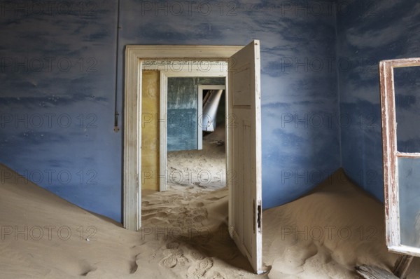 At Kolmanskop, the abandoned ghost town of the diamond days of the early 1900 and of German origin.