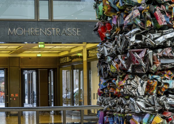 Interior design, artwork made from compressed scrap cars, partially vacant Shopping Quartier 205 in