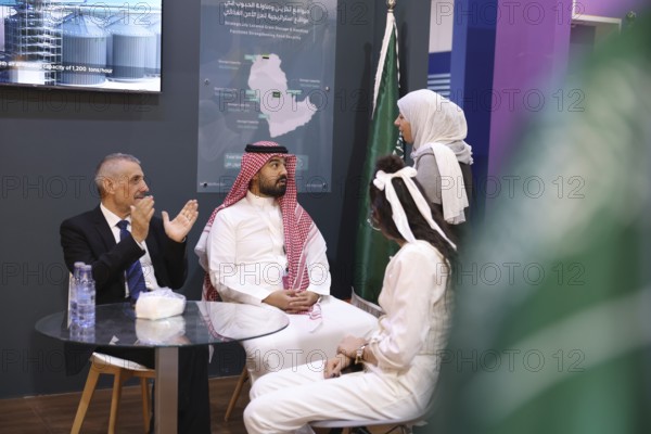 Saudi companies showcase products and investments inside the Saudi pavilion at the Damascus