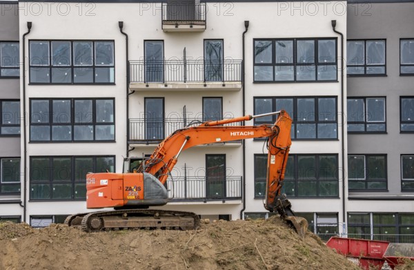 Shell construction, shortly in front of completion of a residential building, new Graf Bismarck