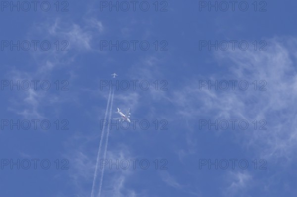 Two airliners Airbus A380 jet passenger aircraft of Emirates airlines and a Boeing 737 of Norweign