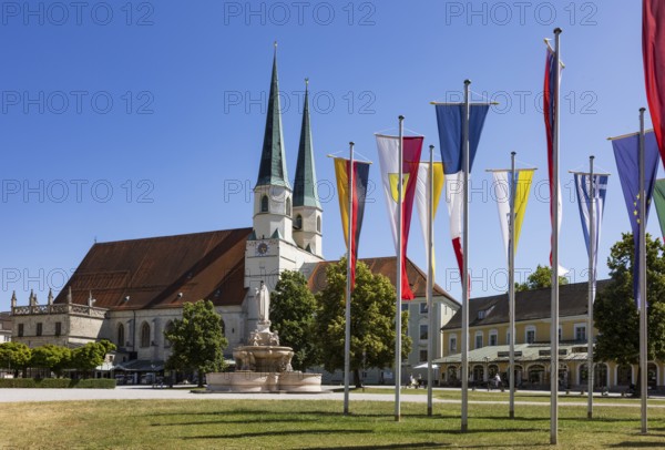National flags at Kapellplatz with the collegiate parish church of St Philip and St James, place of
