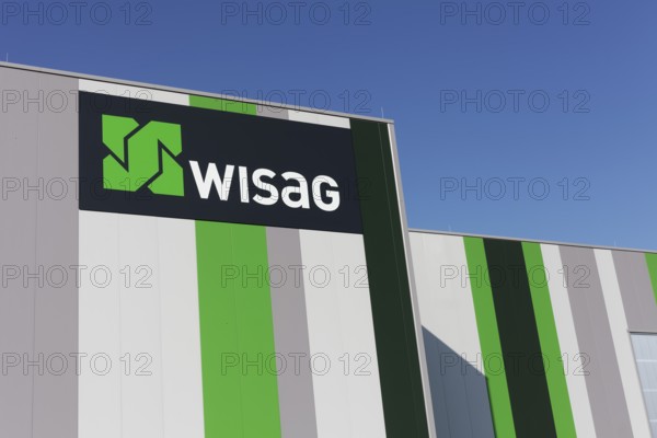WISAG, logo on industrial building, service company for building technology and infrastructure,