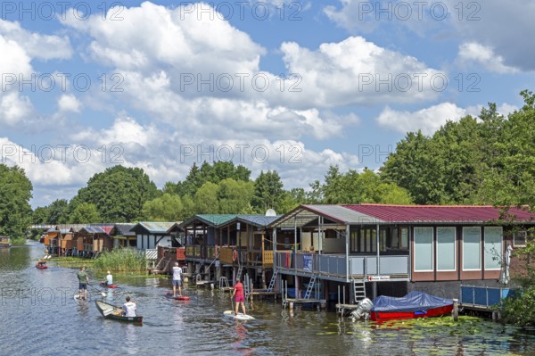 Canoeing, stand-up paddling, boathouses, holiday homes on the canal between Mirower See and
