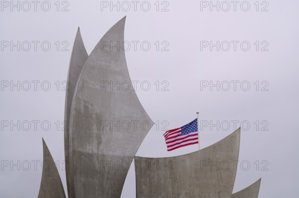 US flag, flag of the USA over Les Braves, memorial of Anilore Banon, polynational memorial to the