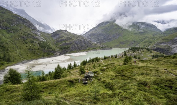 Cloudy mountain landscape, reservoir Speicher Margaritzen, Großglockner High Alpine Road, Hohe