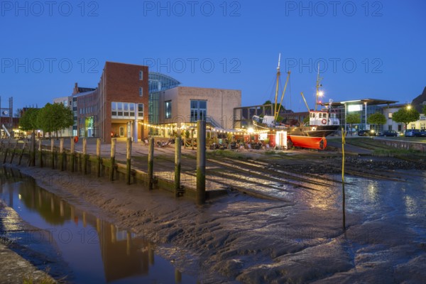 Town hall, harbour, low tide, illuminated, blue hour, Husum, North Sea, North Frisia,