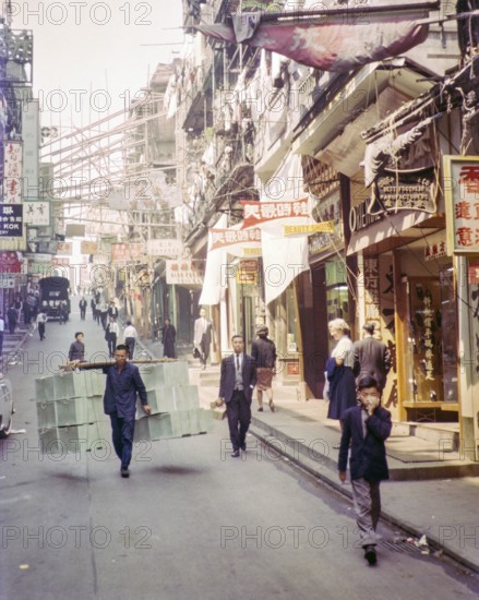 Captioned as 'Chinese street scene', Victoria, Hong Kong, Asia 1964