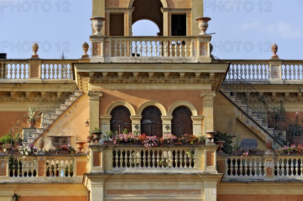 Magnificent city villa Palazzo Rosi with terraces, balconies, balustrades, stairs, arches, columns,