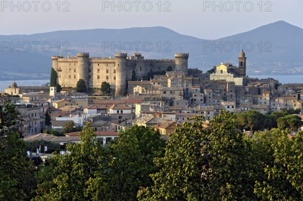 Castello Odescalchi fortress, Duomo Santo Stefano cathedral, behind Lake Bracciano, Lago di
