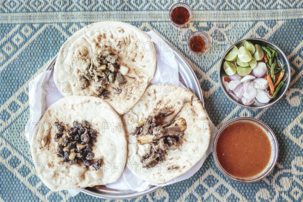 Traditional camel restaurant in Salalah, three kinds of camel meat (dry braised, boiled and