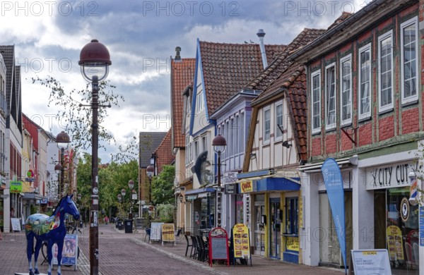 Buildings and shops in Lange Straße in the historic old town centre of Nienburg an der Weser.