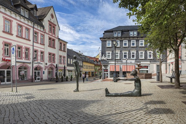 Market street with pharmacy fountain in Ilmenau, Thuringia, Germany