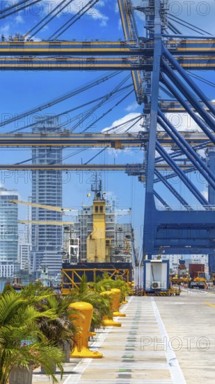 Busy international industrial port with freight and shipment docks and cargo containers